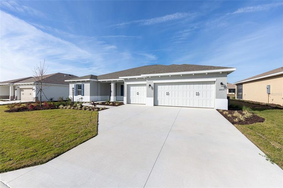 Front exterior of a new home in , Ocala, FL, highlighting curb appeal (Image 18). Front exterior of a new home in , Ocala, FL, highlighting curb appeal (Image 18).