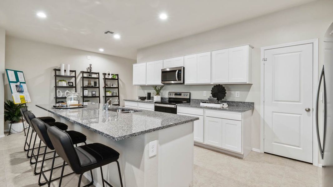 Representative furnished interior of a home built from the Pelican by D.R. Horton in Upper Canyon, Phoenix (Image 9).