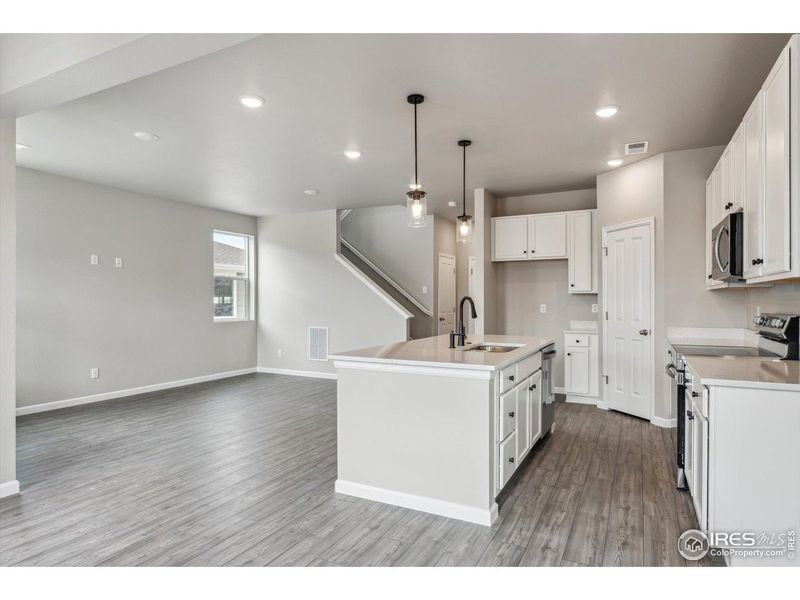 Furnished interior view inside a new home in Parkway at Prairie Center Village, Brighton (Image 8).