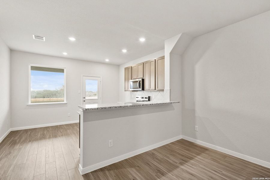 Furnished interior view inside a new home in Abbott Place, St. Hedwig (Image 7).