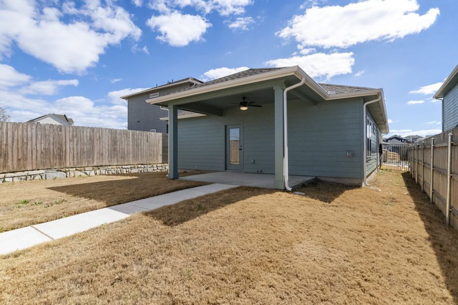 Exterior details and patio area of a home in Whisper Valley, Manor (Image 18).