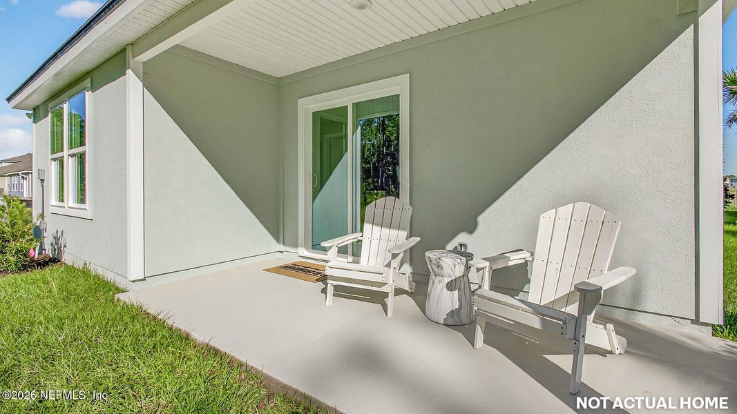 Exterior details and patio area of a home in Rookery, Green Cove Springs (Image 2).
