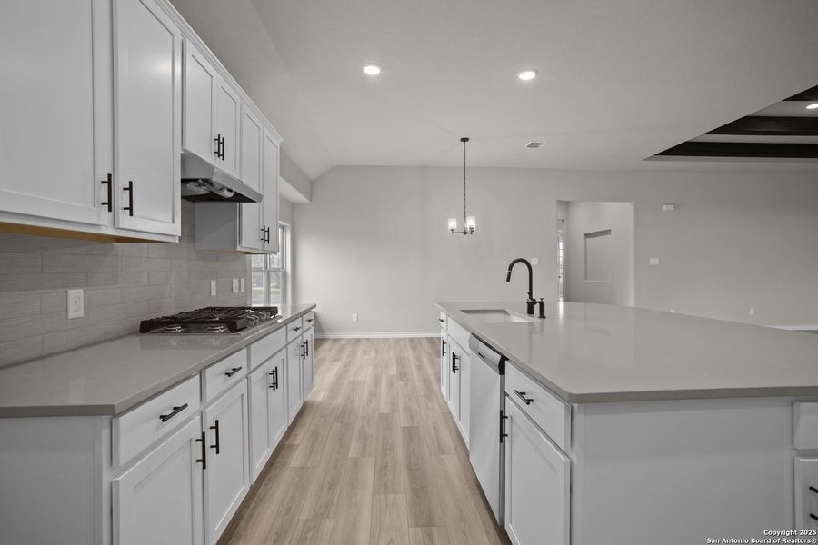 Furnished interior view inside a new home in Potranco Oaks, Castroville (Image 13).