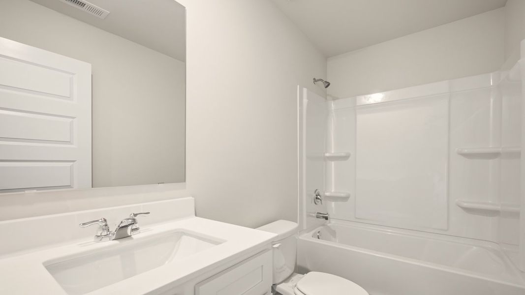 Representative furnished interior of a home built from the Saratoga by D.R. Horton in Shoal Creek, Hampton (Image 10).