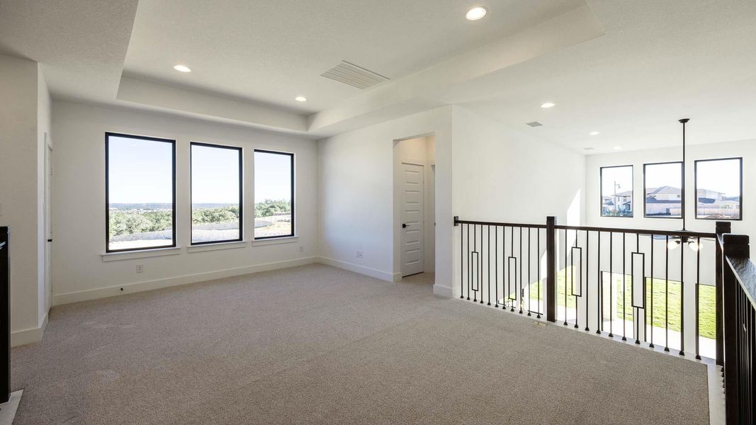 Spacious, unfurnished interior of a new home in Eldorado At Santa Rita Ranch 60', Liberty Hill (Image 9).