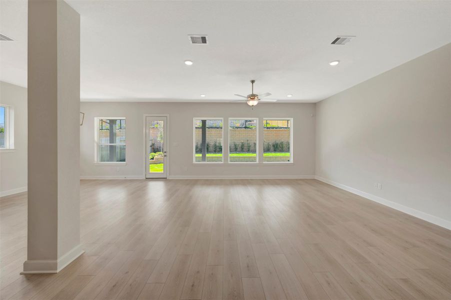 Spacious, unfurnished interior of a new home in The Woodlands Hills - Summit Collection, Willis (Image 22).