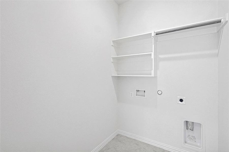 Clothes washing area featuring electric dryer hookup, gas dryer hookup, and washer hookup