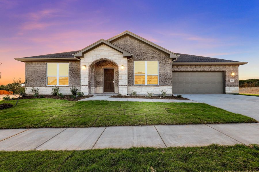Representative exterior photo of a completed home built from the Garrison I by Cheldan Homes in Stoneview, Glen Rose, TX (Image 25).
