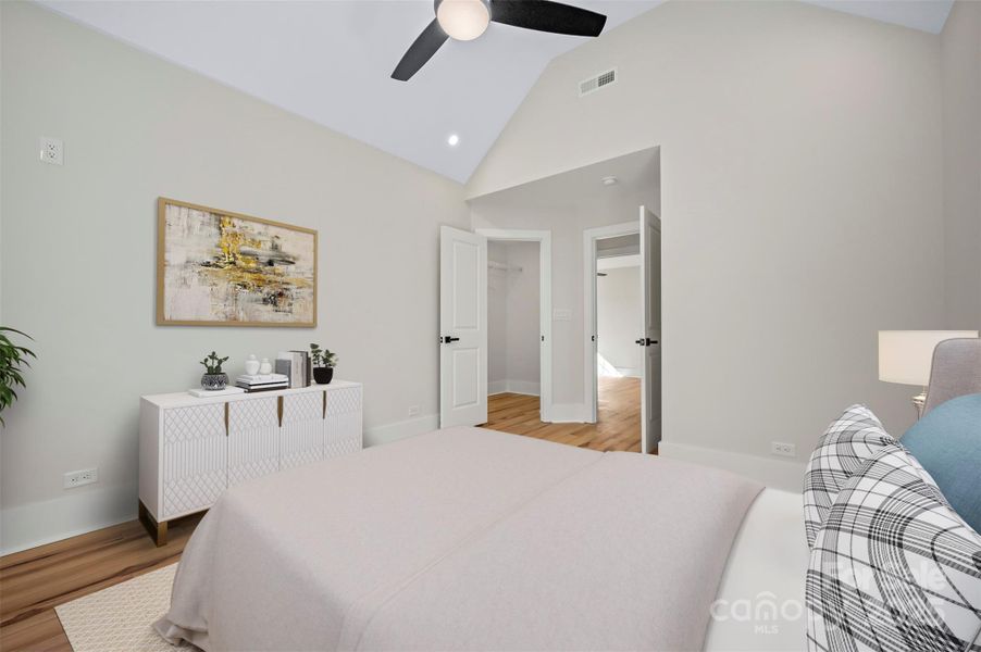 Bedroom #1 on the upper level with walk-in closet. Virtually staged.