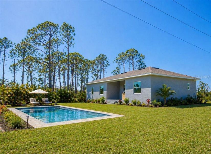 Exterior details and patio area of a home in , Port Charlotte (Image 12).