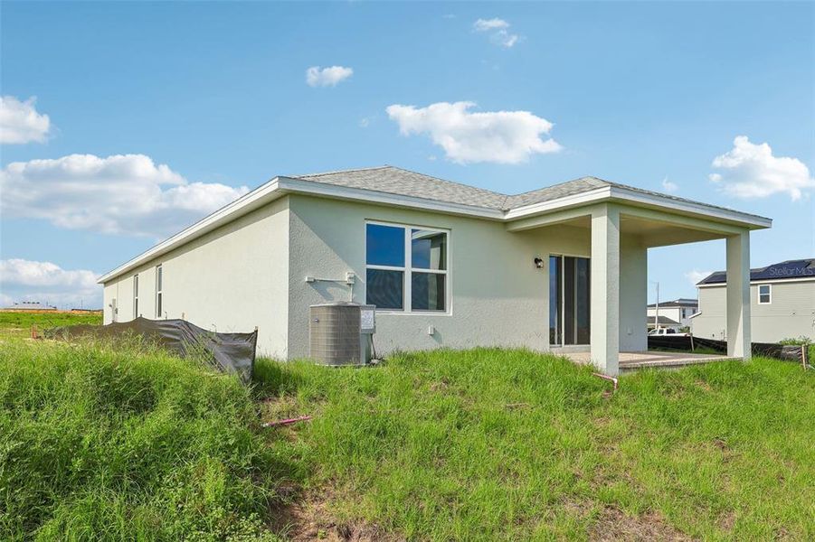 Exterior details and patio area of a home in Hamilton Bluff, Haines City (Image 25).