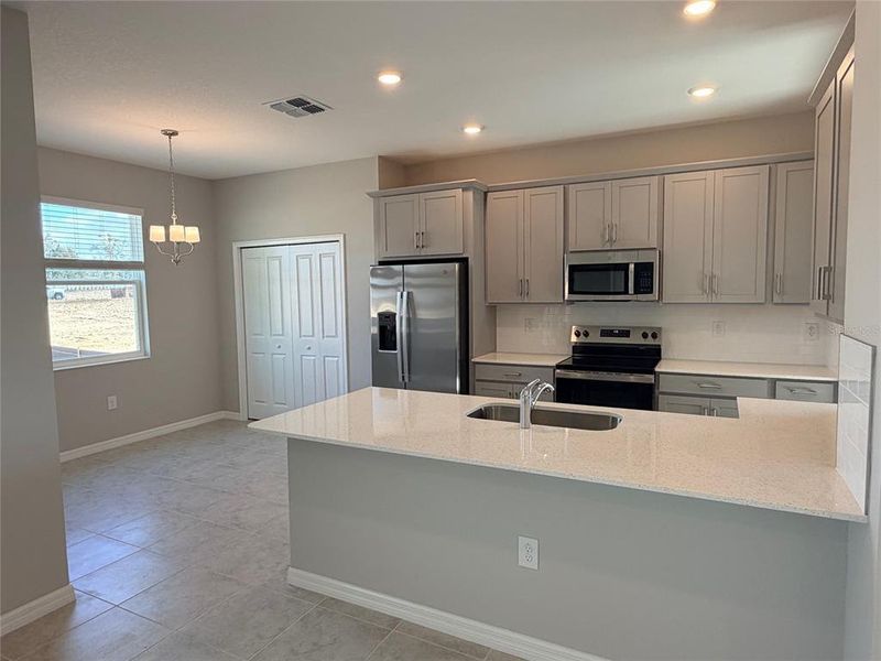 Furnished interior view inside a new home in Pinecone Reserve, Brooksville (Image 4).