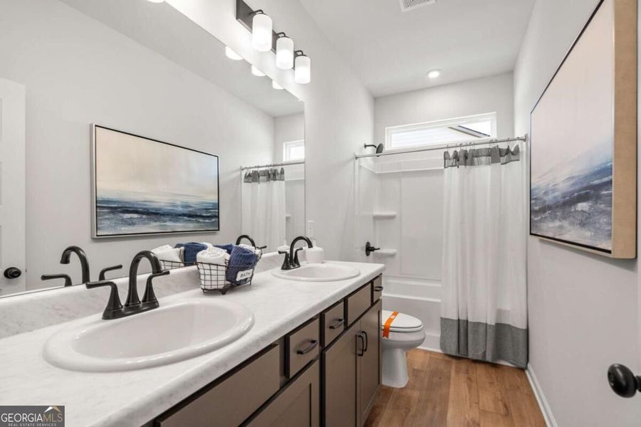Furnished interior view inside a new home in Cobblestone Crossing Commons, Byron (Image 29).