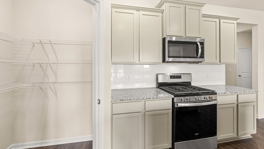Furnished interior view inside a new home in Highland Hills, Graniteville (Image 6).