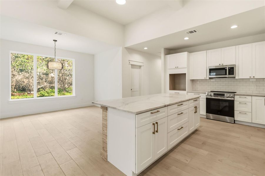 Kitchen open to dining area