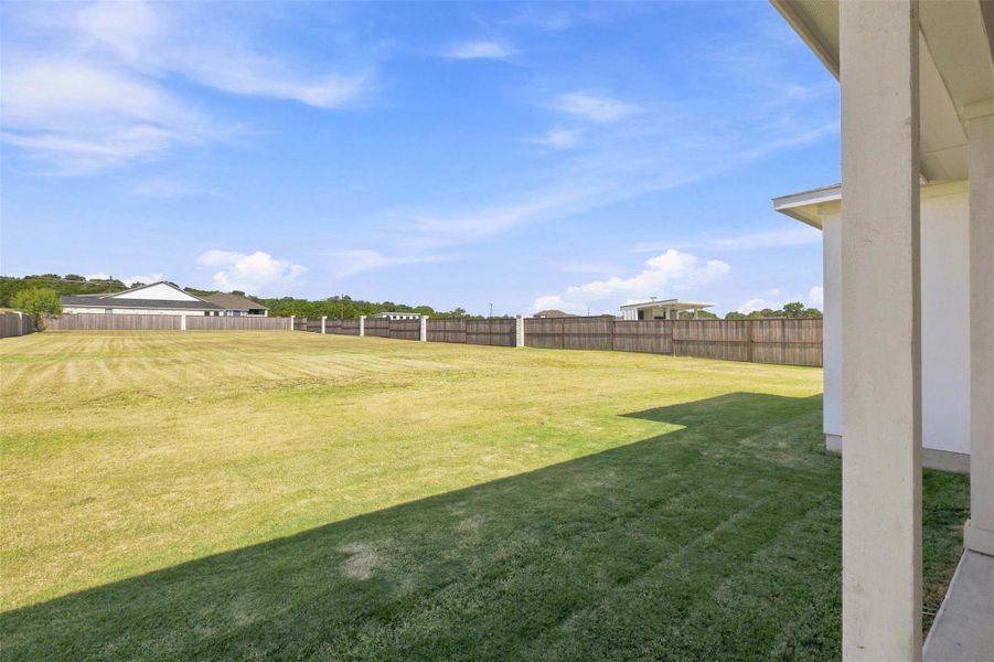 Exterior details and patio area of a home in Northfork, Liberty Hill (Image 22).
