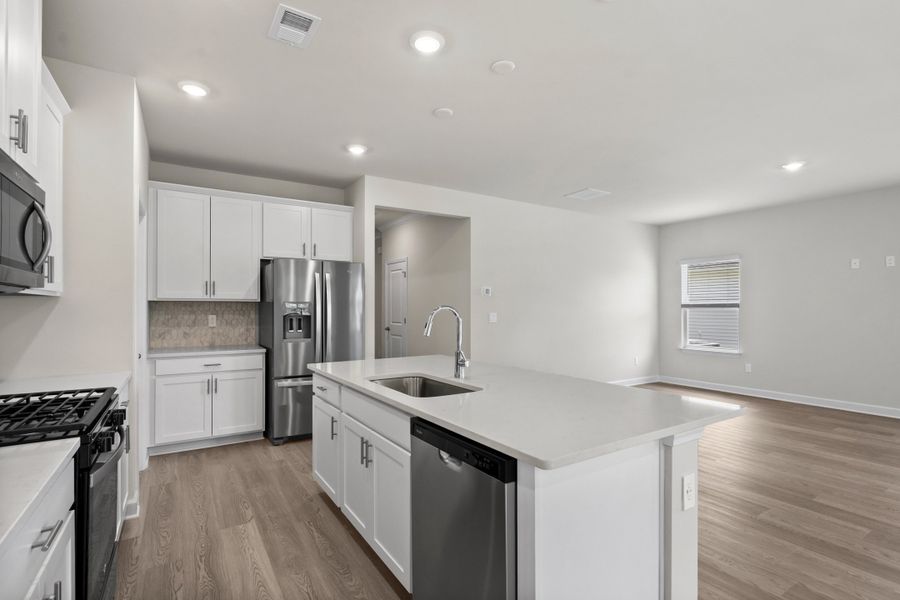 Furnished interior view inside a new home in Cypress Ridge - The Coastline Series, Longs (Image 5).