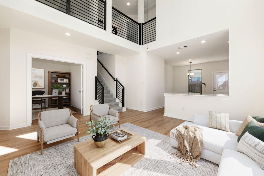 This stunning living area features soaring ceilings and a striking open layout that fills the space with natural light. The sleek black stair railing and upstairs overlook add a modern architectural touch, while the wood-look flooring brings warmth and elegance. Just off the main living area, a private flex room with double doors offers the perfect space for a home office or creative retreat. This stunning living area features soaring ceilings and a striking open layout that fills the space with natural light. The sleek black stair railing and upstairs overlook add a modern architectural touch, while the wood-look flooring brings warmth and elegance. Just off the main living area, a private flex room with double doors offers the perfect space for a home office or creative retreat.