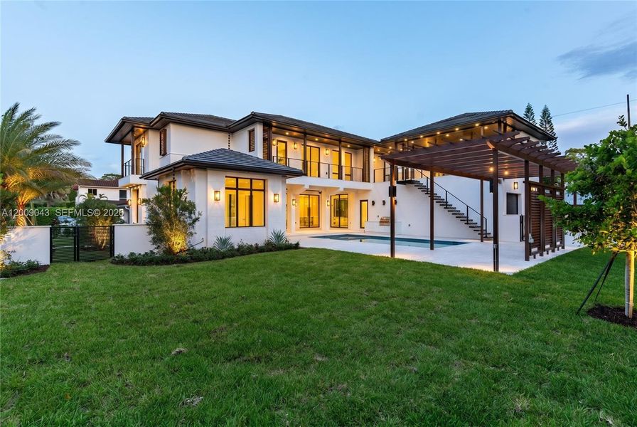 Exterior details and patio area of a home in , Coral Gables (Image 24).