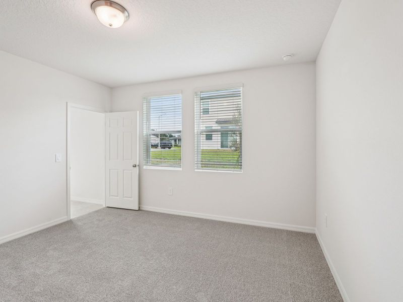 Spacious, unfurnished interior of a new home in Villamar - Classic Series, Winter Haven (Image 8).