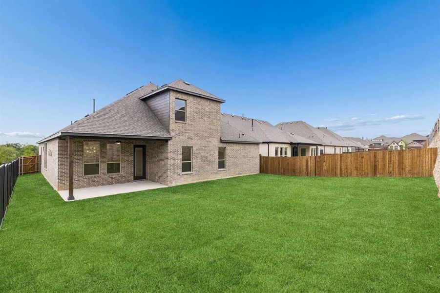 Exterior details and patio area of a home in Timberbrook, Justin (Image 16).