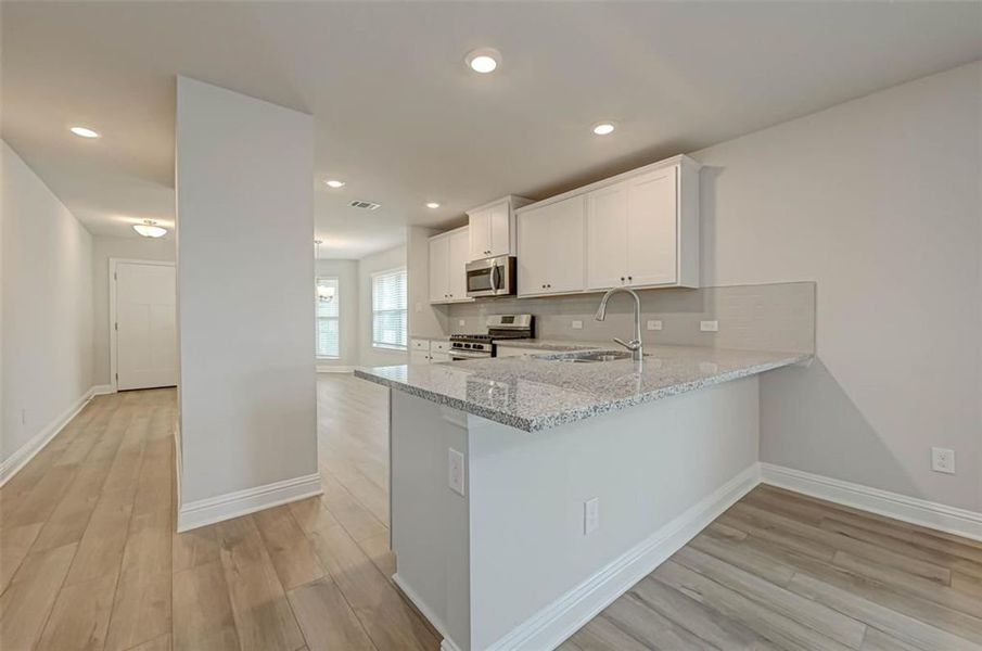 Furnished interior view inside a new home in Parkland Place, Pace (Image 6).