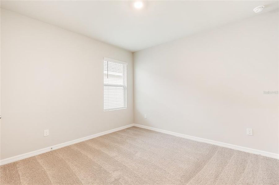 Spacious, unfurnished interior of a new home in Seagrass, Punta Gorda (Image 14).