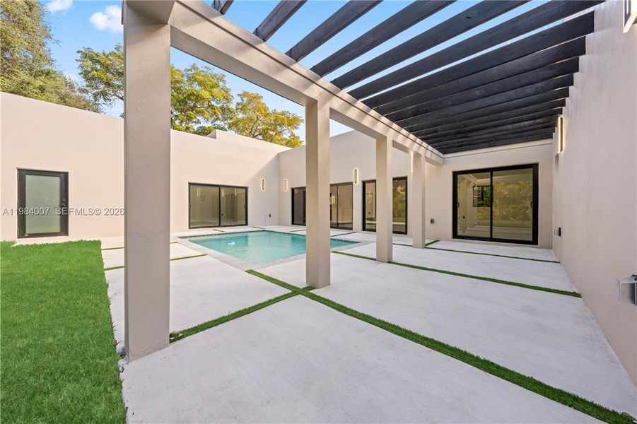 Exterior details and patio area of a home in , North Miami (Image 33).