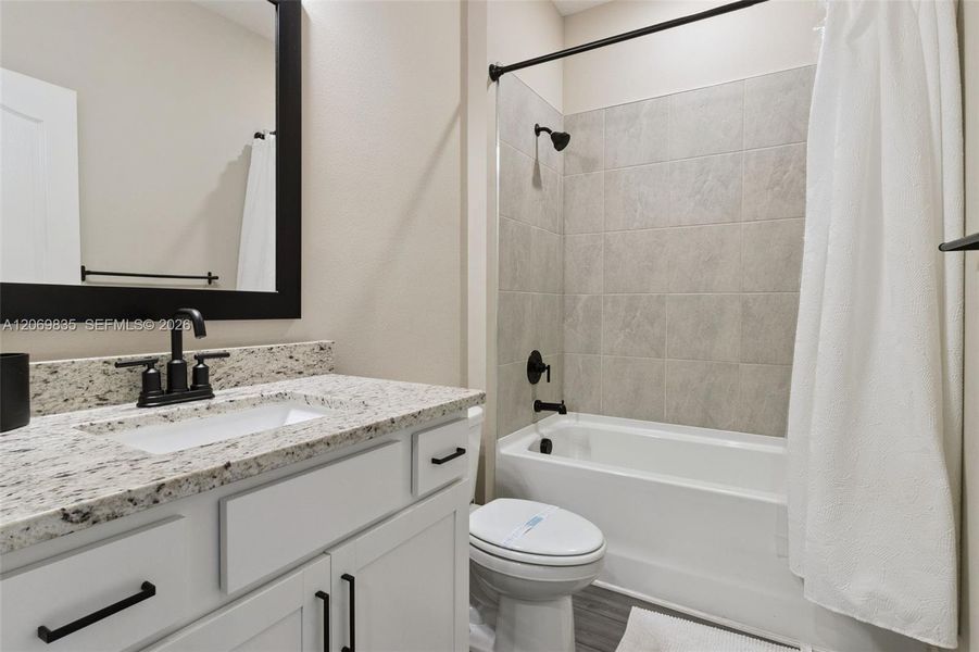 Furnished interior view inside a new home in , Kissimmee (Image 16). Furnished interior view inside a new home in , Kissimmee (Image 16).