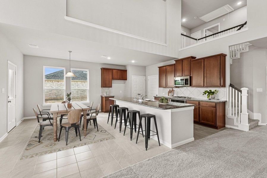 Open kitchen and dining area (*Photo not of actual home and used for illustration purposes only.)