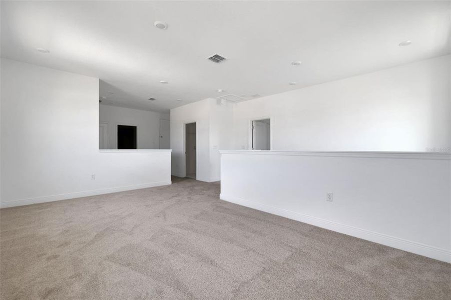 Spacious, unfurnished interior of a new home in Serenade at Ovation, Winter Garden (Image 28). Spacious, unfurnished interior of a new home in Serenade at Ovation, Winter Garden (Image 28).