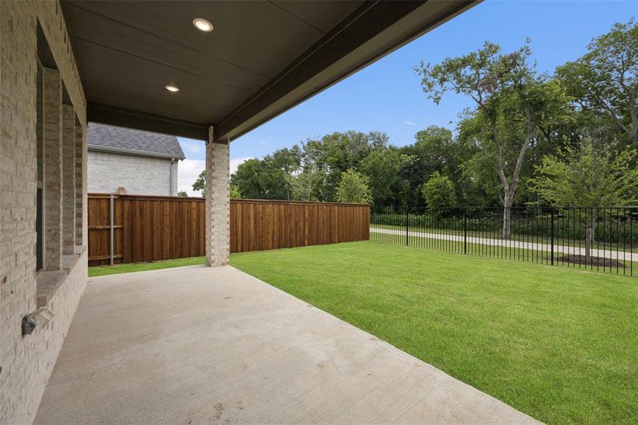 Exterior details and patio area of a home in Painted Tree, McKinney (Image 3). Exterior details and patio area of a home in Painted Tree, McKinney (Image 3).