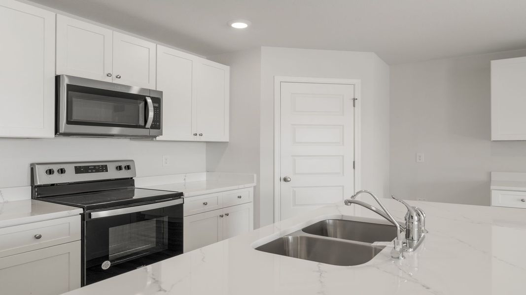 Furnished interior view inside a new home in Sunny Hills, Chipley (Image 6).