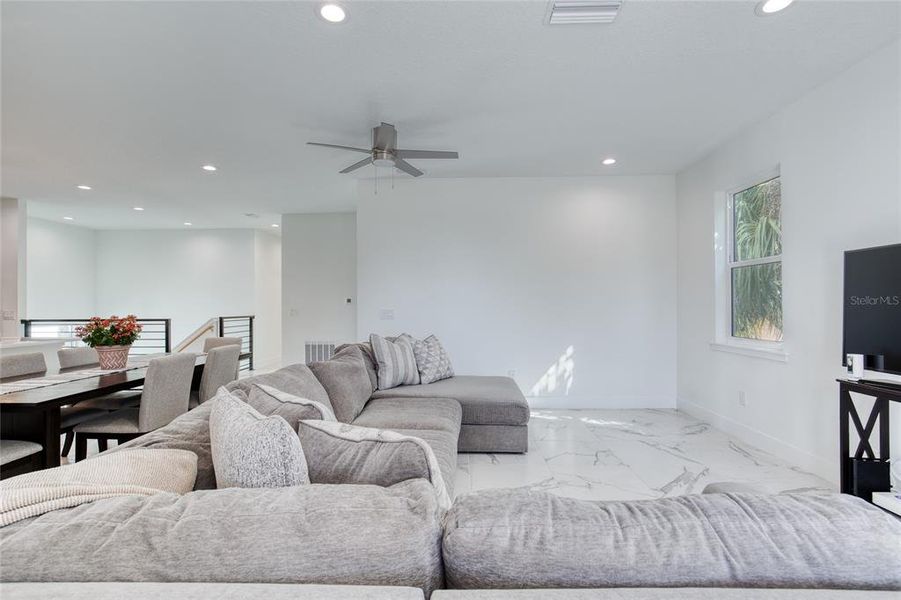 Furnished interior view inside a new home in , Daytona Beach (Image 11).