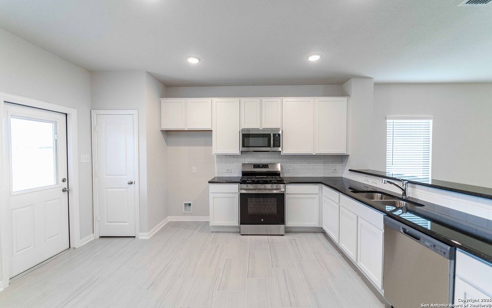 Furnished interior view inside a new home in Morgan Meadows, San Antonio (Image 4). Furnished interior view inside a new home in Morgan Meadows, San Antonio (Image 4).