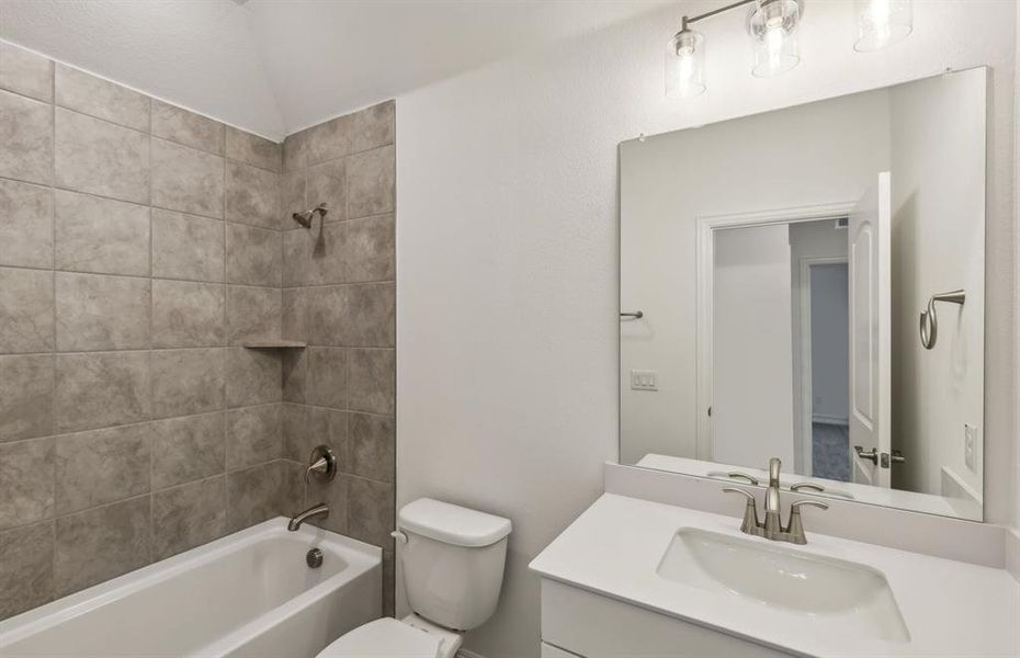 Spacious secondary bathroom with premium finishes *real home pictured