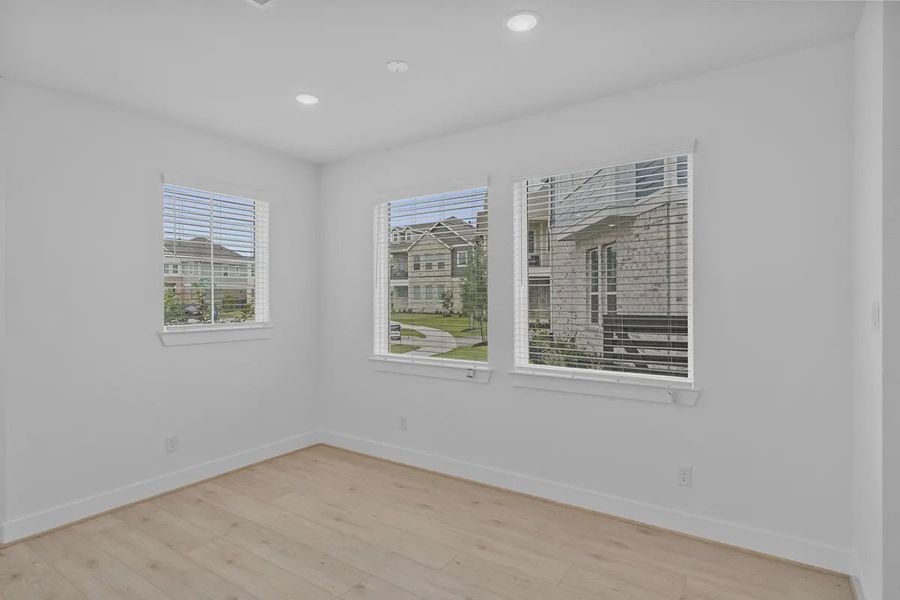 Spacious, unfurnished interior of a new home in Bridgeland Courtyard, Cypress (Image 14).