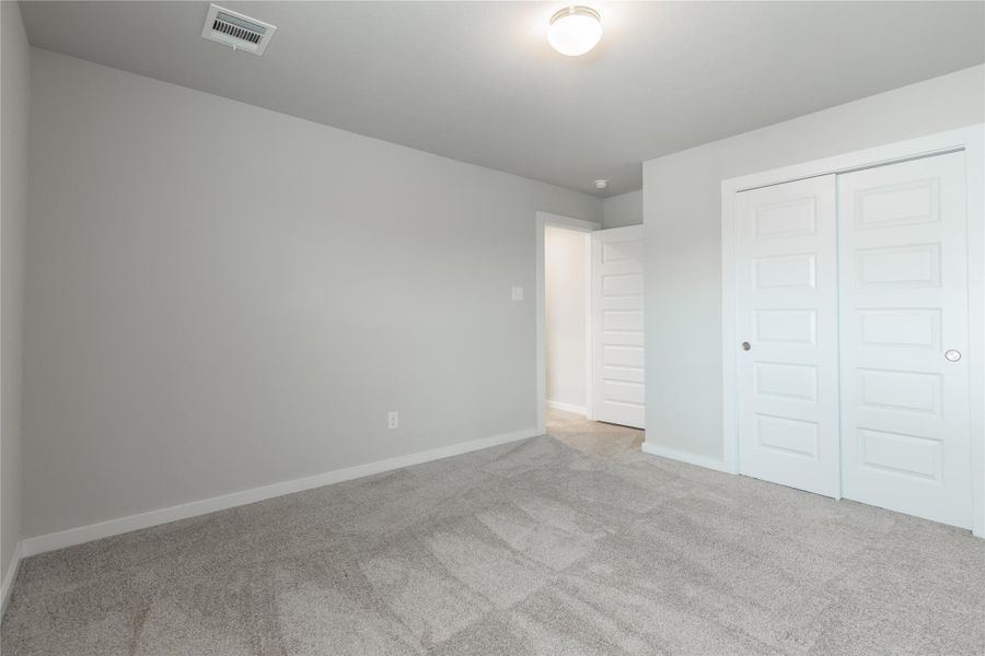Spacious, unfurnished interior of a new home in Morton Creek Ranch, Katy (Image 37).