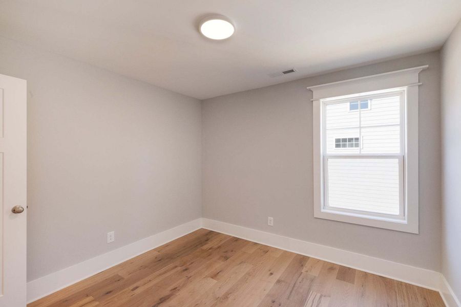 Representative unfurnished interior of a home built from the Austin by Caviness & Cates Communities in Bartlett Manor, Youngsville (Image 141).