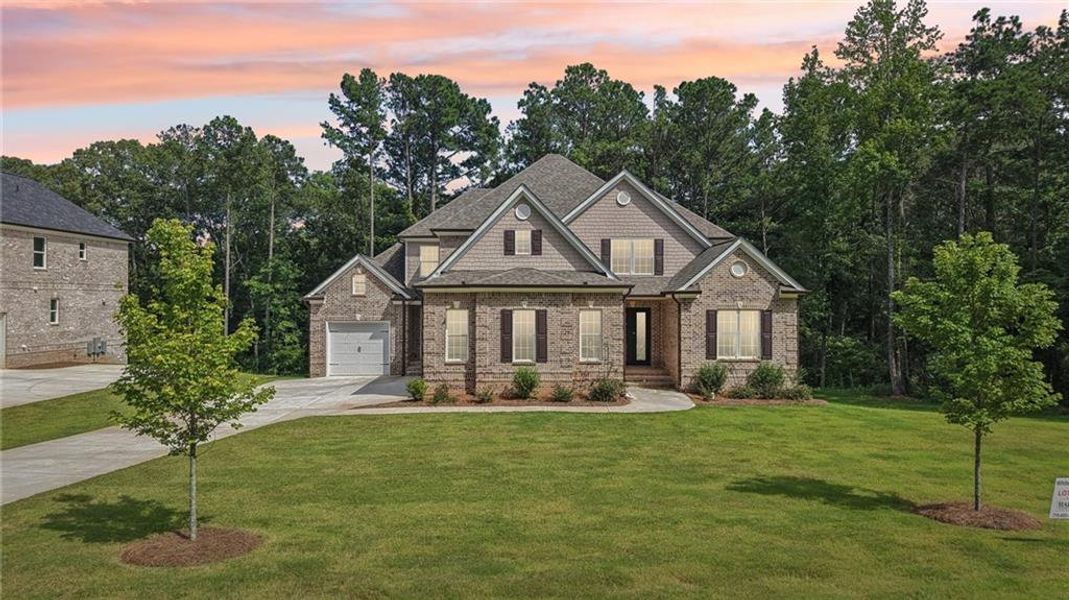Front exterior of a new home in , Douglasville, GA, highlighting curb appeal (Image 12).