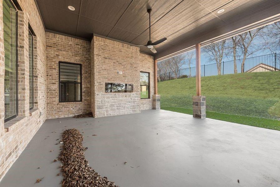 View of patio / terrace featuring ceiling fan