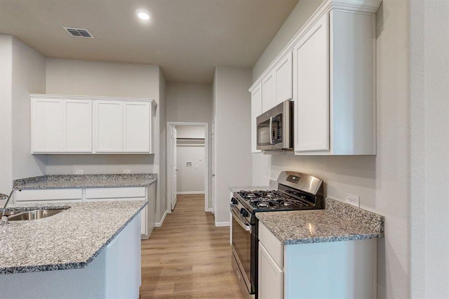 Furnished interior view inside a new home in Kings Way, Denton (Image 4).