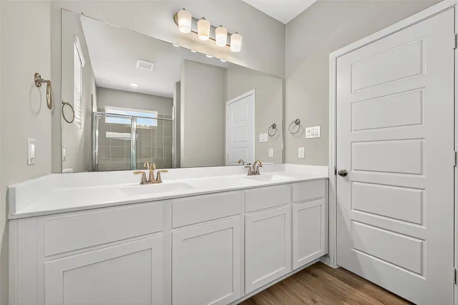 Furnished interior view inside a new home in Sunterra, Katy (Image 3).