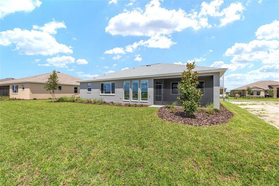 Front exterior of a new home in On Top of the World Communities, Ocala, FL, highlighting curb appeal (Image 18).