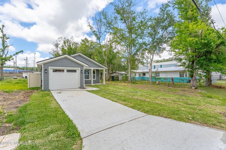 Front exterior of a new home in , Jacksonville, FL, highlighting curb appeal (Image 24). Front exterior of a new home in , Jacksonville, FL, highlighting curb appeal (Image 24).