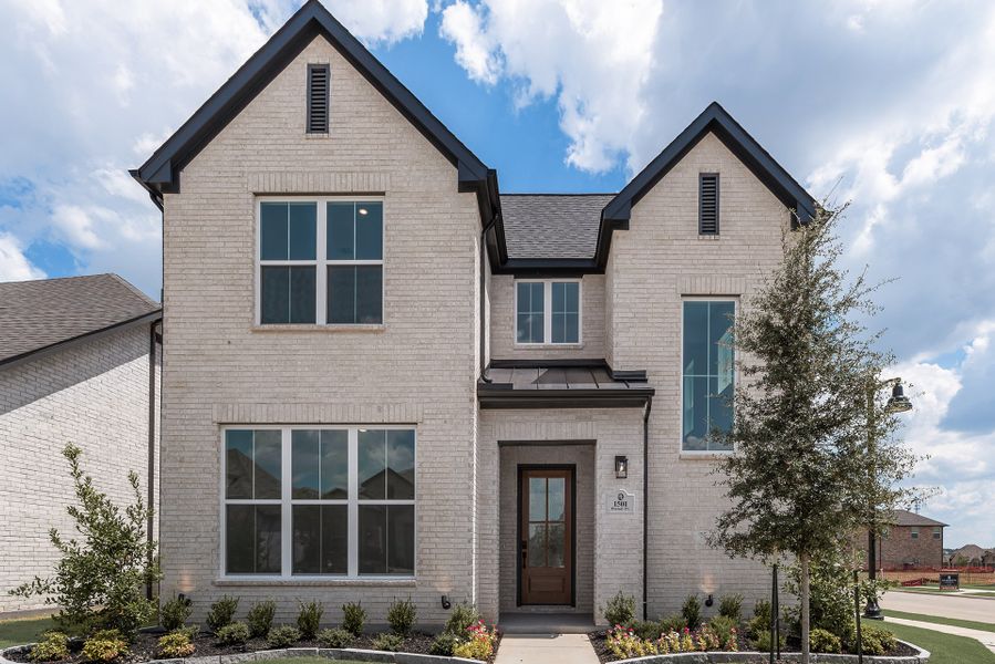 Front exterior of a new home in Cottages of Celina, Celina, TX, highlighting curb appeal (Image 2). Front exterior of a new home in Cottages of Celina, Celina, TX, highlighting curb appeal (Image 2).