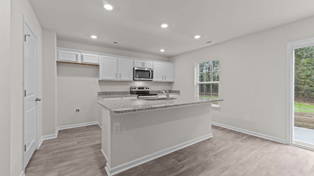 Furnished interior view inside a new home in Madeline Farm, New Bern (Image 5).