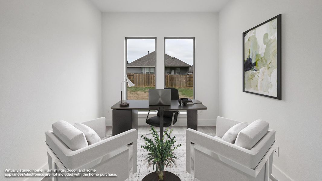 Office with wood finished floors and baseboards