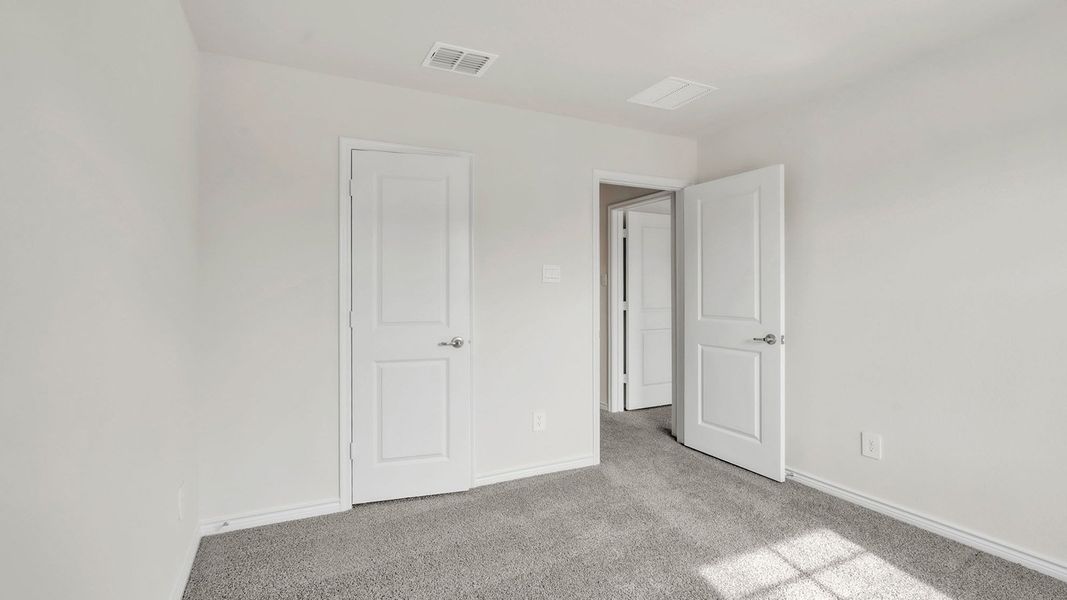 Spacious, unfurnished interior of a new home in The Landing at Hidden Lakes, McKinney (Image 26).