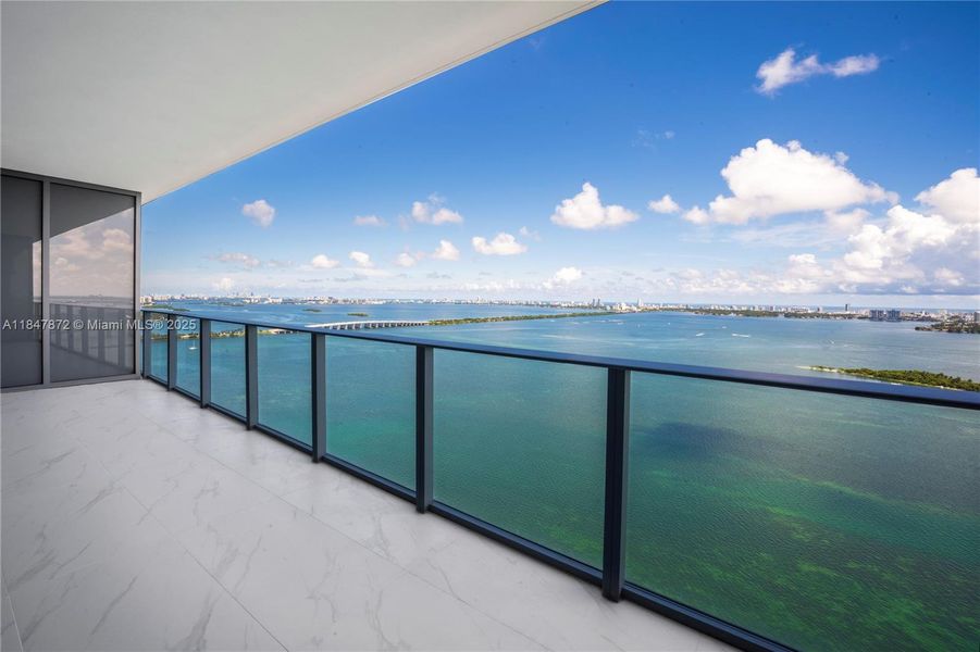 Exterior details and patio area of a home in Aria Reserve, Miami (Image 2).